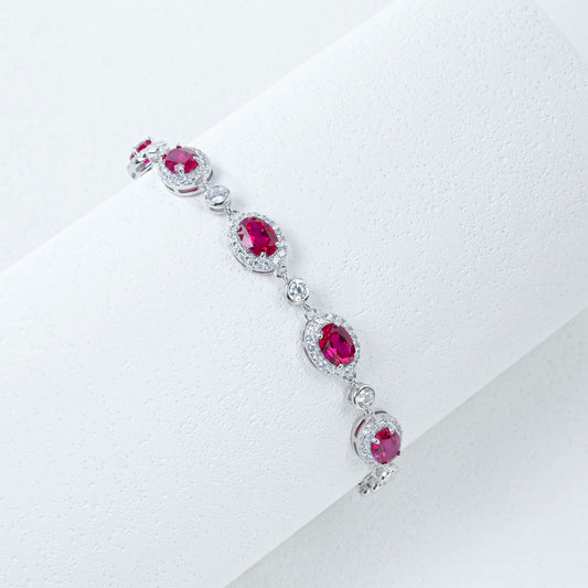 Oval ruby halo bracelet