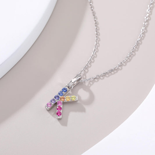Vibrant lab-grown sapphire "K" pendant | Sterling silver initial necklace