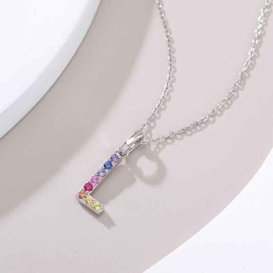 Vibrant lab-grown sapphire "L" pendant | Sterling silver initial necklace