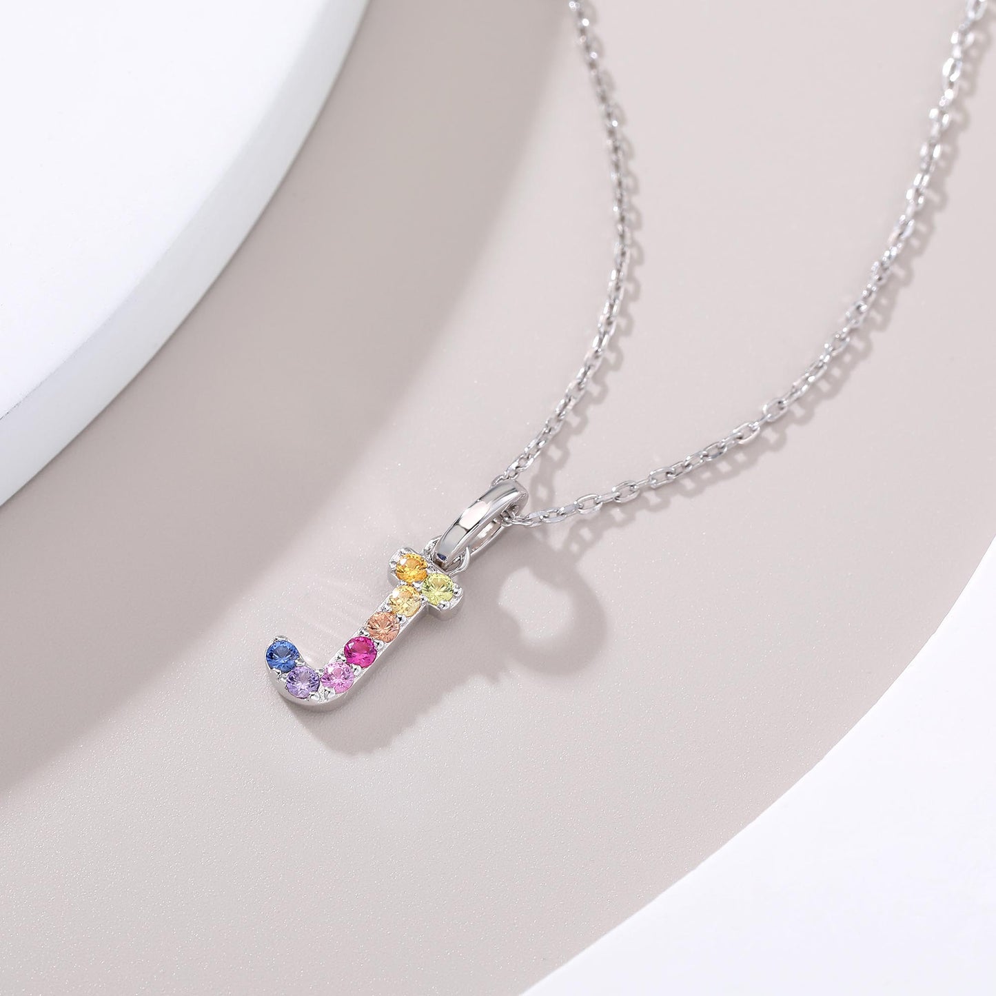 Vibrant lab-grown sapphire "J" pendant | Sterling silver initial necklace