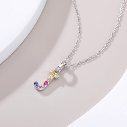 Vibrant lab-grown sapphire "J" pendant | Sterling silver initial necklace