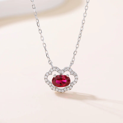 Vibrant oval ruby "Cloud Halo" pendant | Sterling silver dainty gemstone necklace