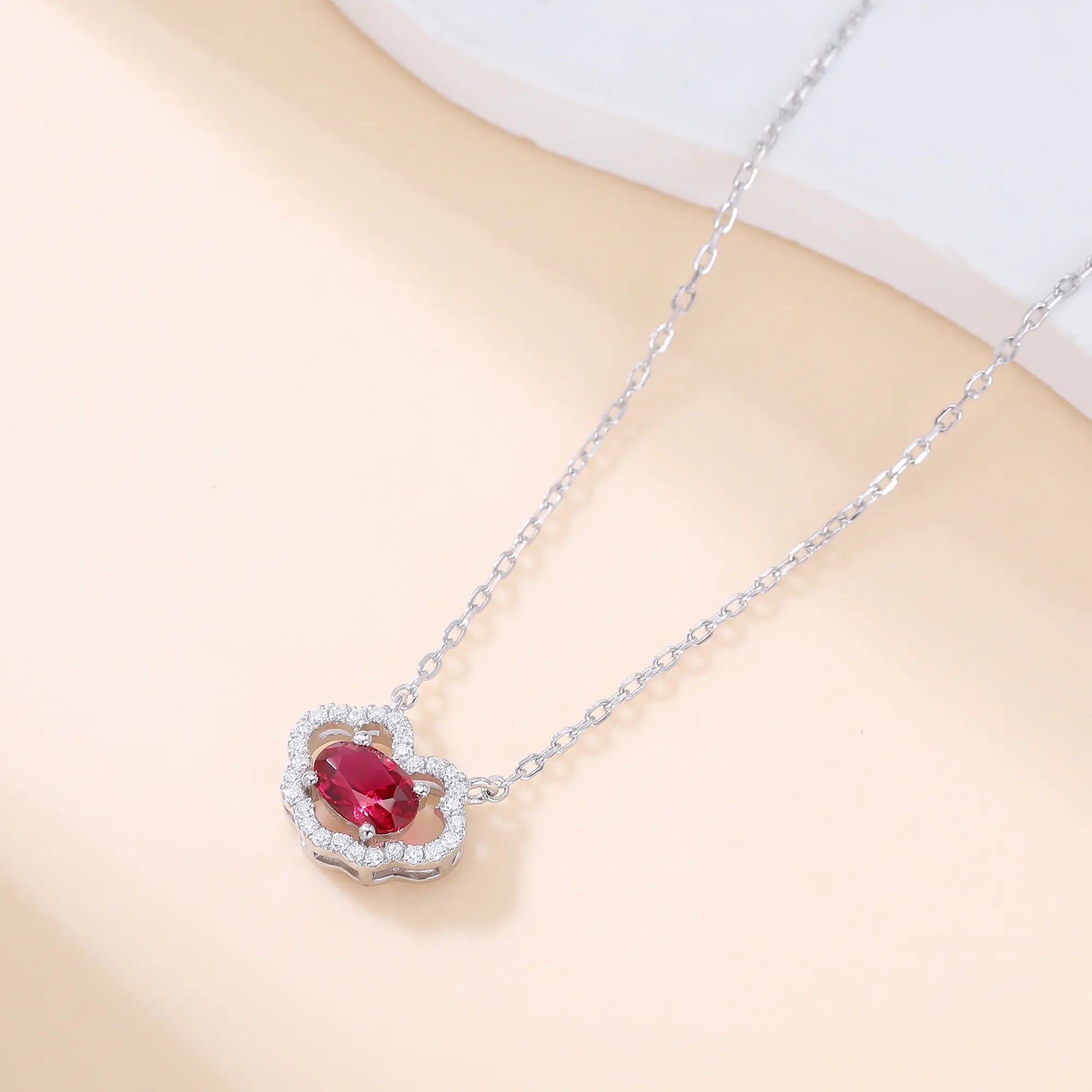 Vibrant oval ruby "Cloud Halo" pendant | Sterling silver dainty gemstone necklace