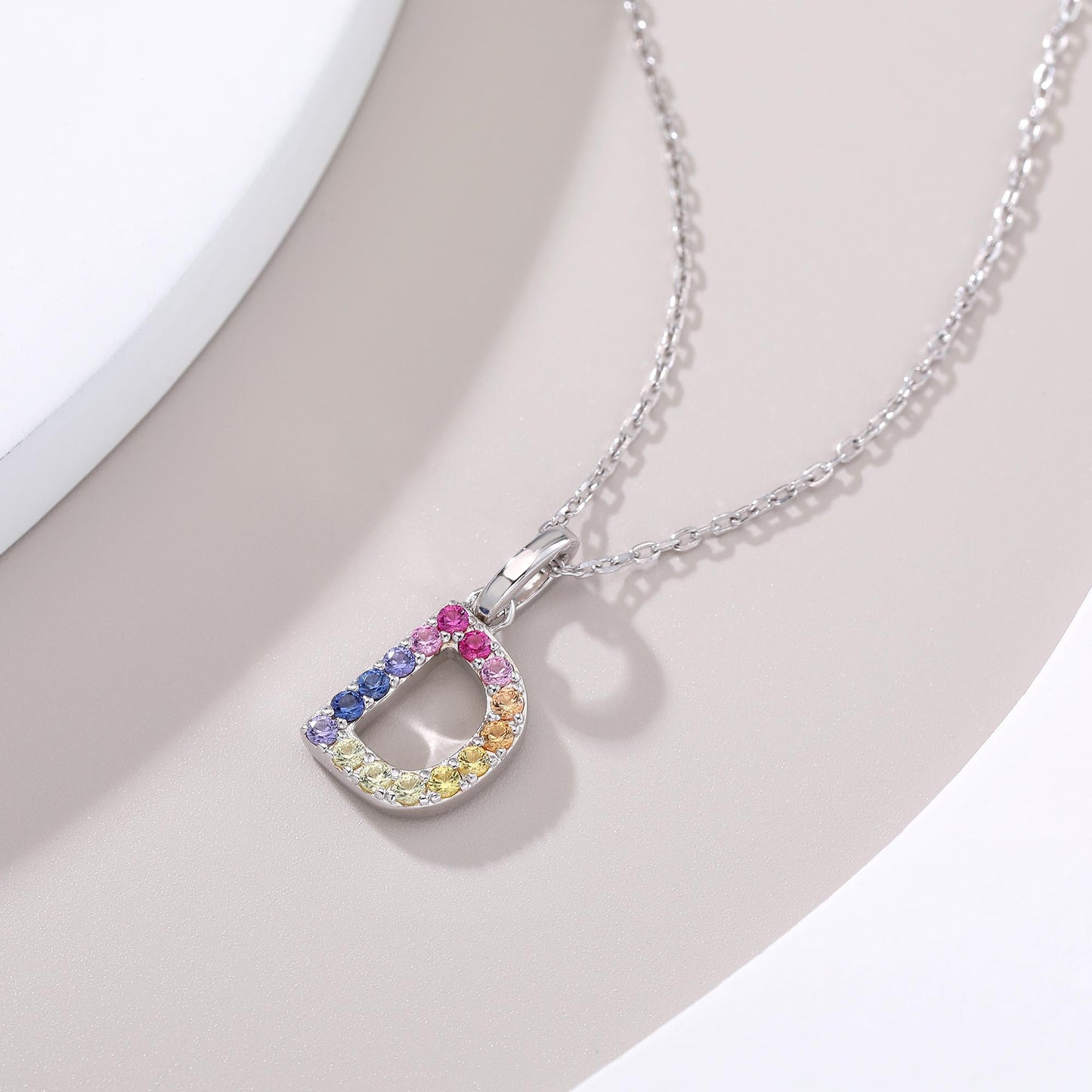 Vibrant lab-grown sapphire "D" pendant | Sterling silver initial necklace