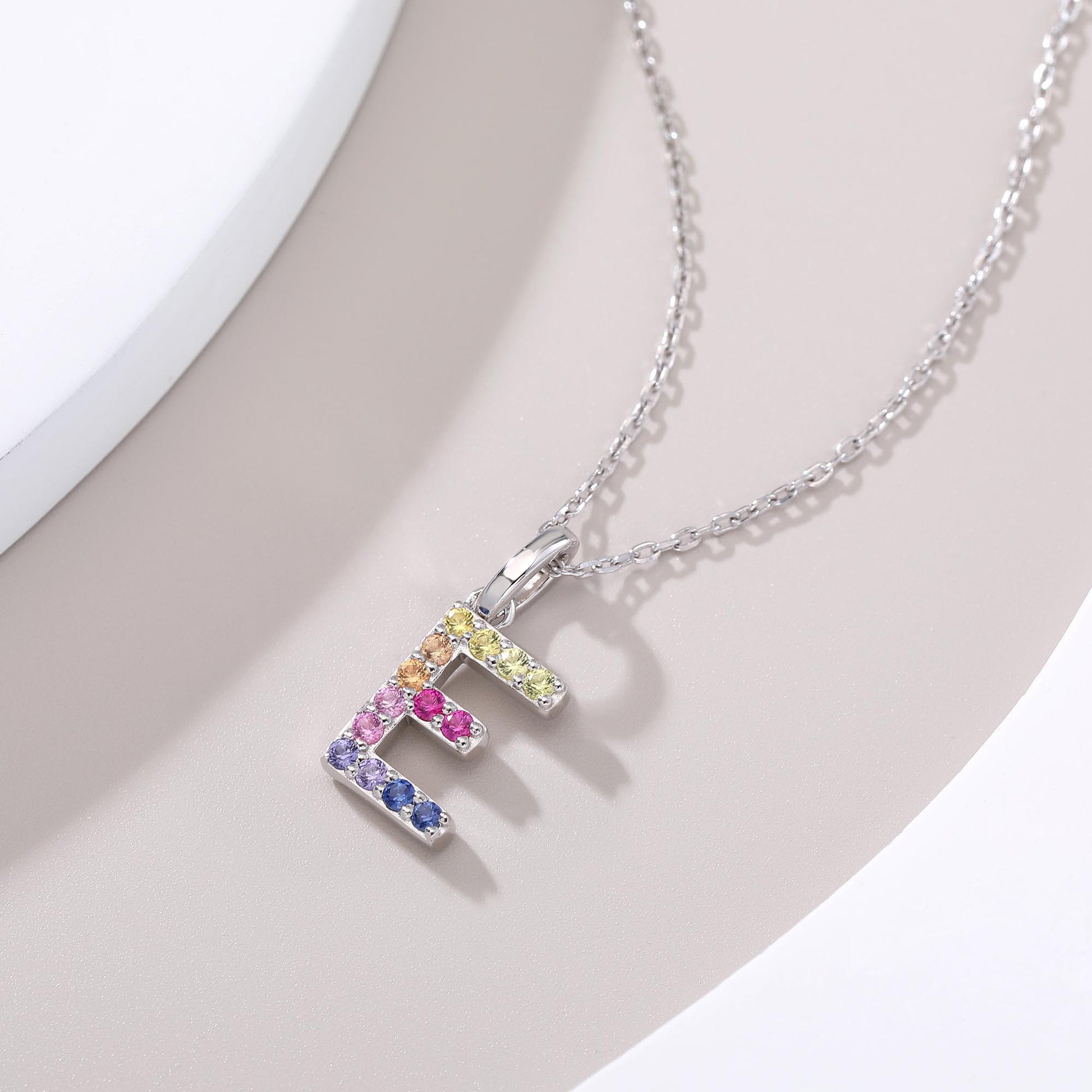 Vibrant lab-grown sapphire "E" pendant | Sterling silver initial necklace