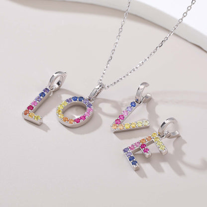 Vibrant lab-grown sapphire "E" pendant | Sterling silver initial necklace