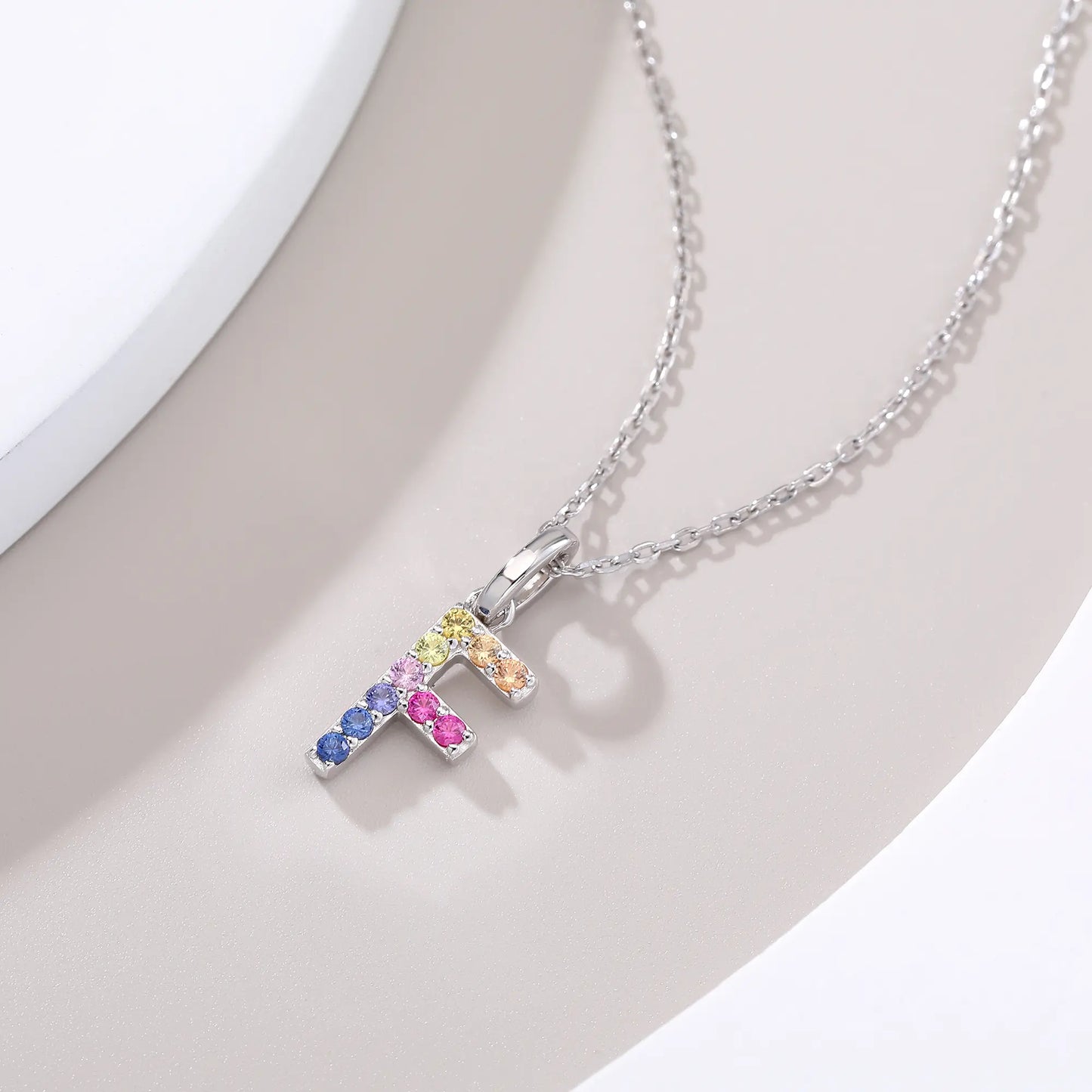 Vibrant lab-grown sapphire "F" pendant | Sterling silver initial necklace