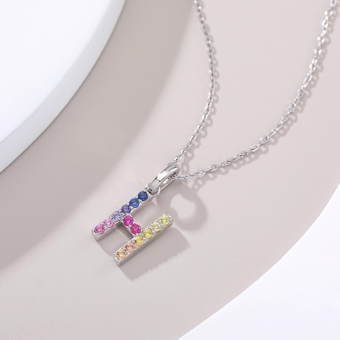Vibrant lab-grown sapphire "H" pendant | Sterling silver initial necklace